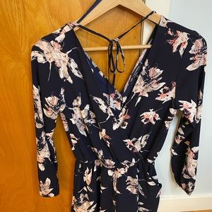 Navy and white pattern long sleeve romper with tie on back size small